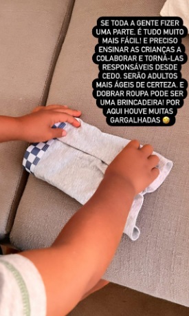 Tânia Ribas de Oliveira mostrou um dos filhos a dobrar roupa e falou sobre a importância de as crianças ajudaram nas tarefas domésticas.