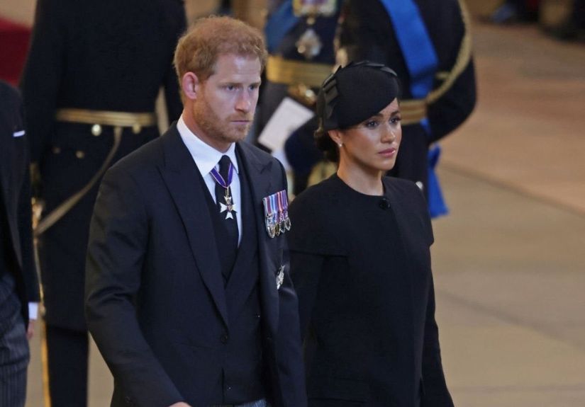Meghan e Harry ficaram em segunda fila no funeral da rainha Isabel II e surgiram várias expeculações. Saiba os verdadeiros motivos.